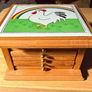 Vintage wooden coaster set featuring a tile with a "Chicken and Chicks" design,